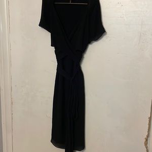 Es Ada sheer black dress with wrap tie side zip